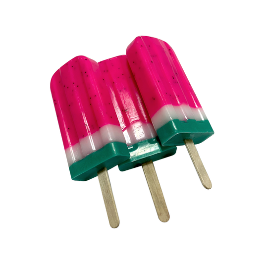 A pink watermelon-shaped soap bar with green accents, designed to resemble a popsicle.