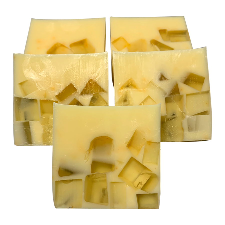 Handmade soap bars with visible hemp seed inclusions, cut and arranged in rows on a white background.